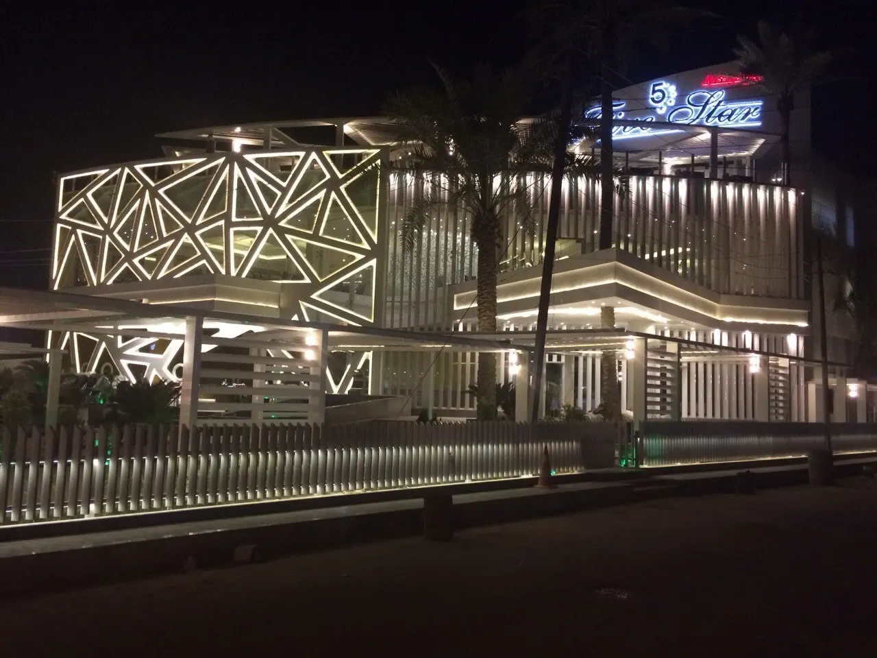 Illuminated patterned glass facade, 5 Stars Restaurant