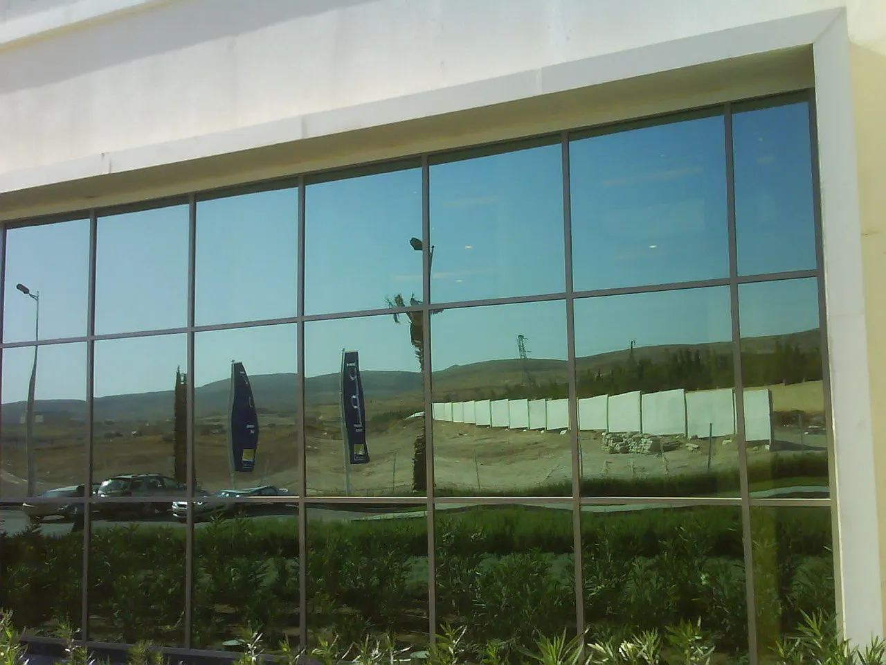 Reflective green curtain wall, Emaar Offices Damascus